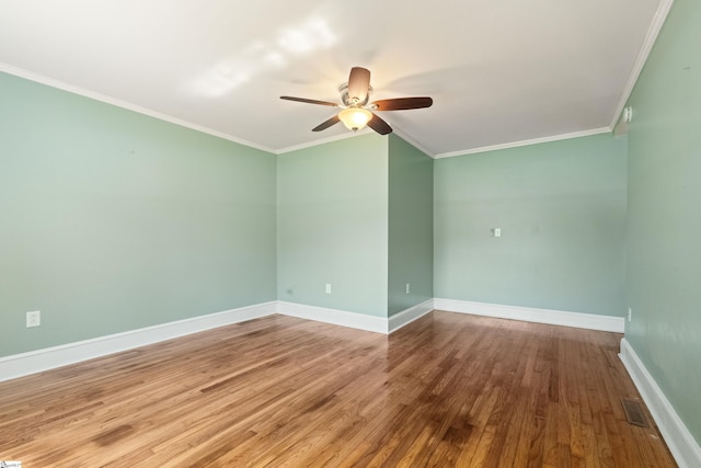 105 Pinewood Ave, Clinton, SC 29325 - unfurnished room with baseboards, a ceiling fan, crown molding, and wood finished floors