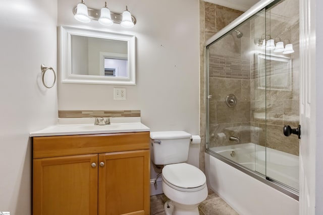 105 Pinewood Ave, Clinton, SC 29325 - full bath featuring toilet, vanity, and bath / shower combo with glass door