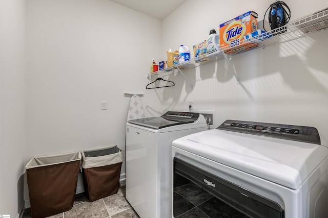 laundry area featuring washer and dryer and laundry area