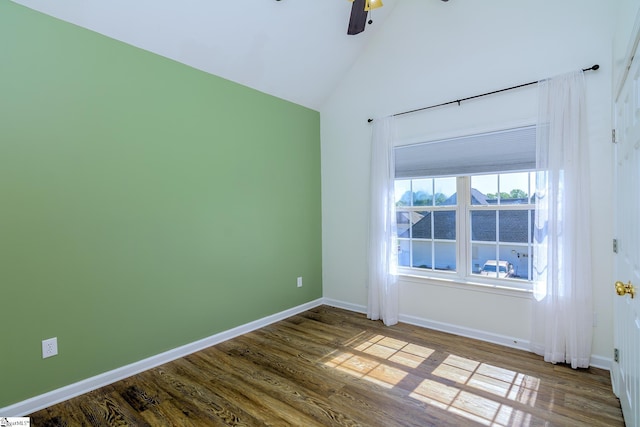 unfurnished room with dark wood-style flooring, baseboards, and ceiling fan