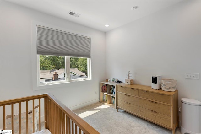 bedroom featuring light colored carpet, visible vents, and recessed lighting