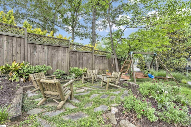 view of yard with a fenced backyard