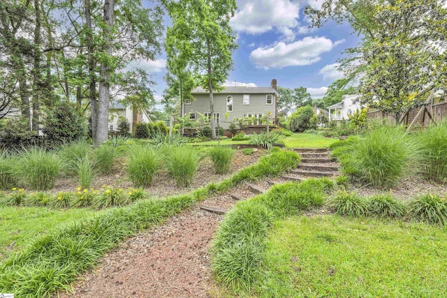view of yard featuring a wooden deck