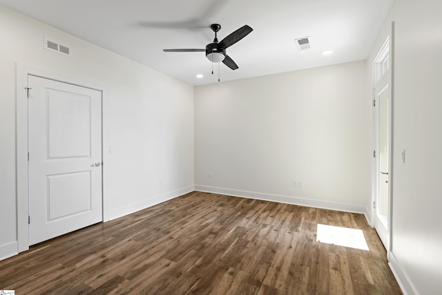 98 E Mcbee Ave Unit 205, Greenville, SC 29601 - unfurnished bedroom featuring visible vents, baseboards, recessed lighting, and wood finished floors