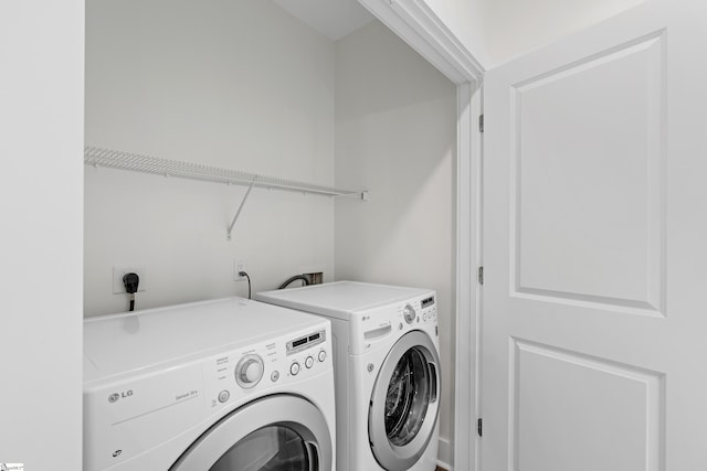 98 E Mcbee Ave Unit 205, Greenville, SC 29601 - laundry area with laundry area and washing machine and dryer