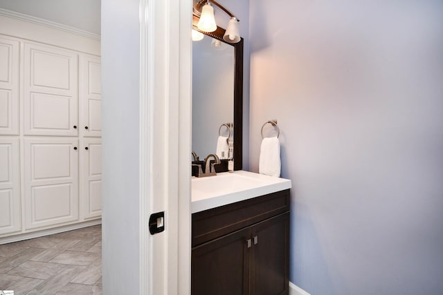 bathroom featuring vanity and baseboards