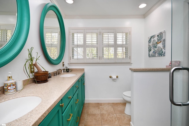 bathroom with crown molding, a sink, and plenty of natural light