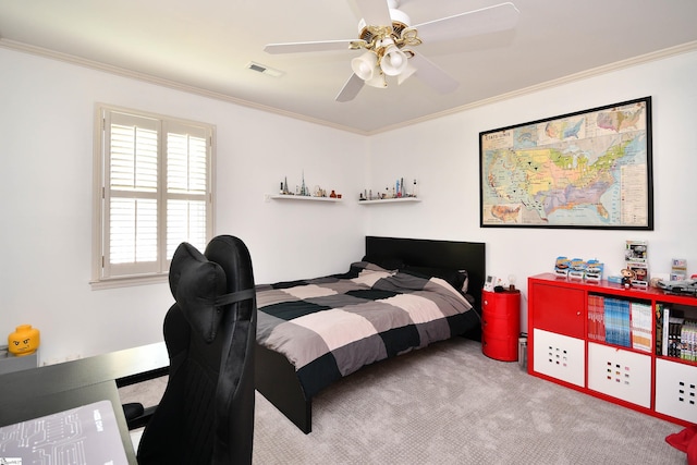 carpeted bedroom with visible vents, ornamental molding, and ceiling fan