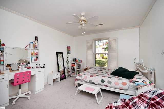 bedroom with light carpet, ceiling fan, ornamental molding, and visible vents