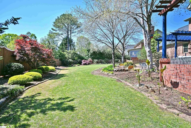 view of yard featuring fence