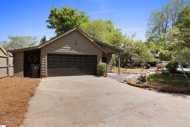 view of front of home with an attached garage and driveway