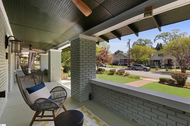 view of patio / terrace with a porch and a ceiling fan