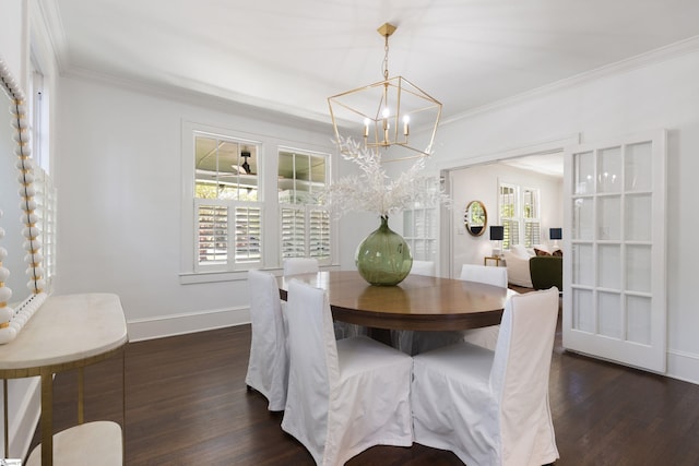 dining room with crown molding, baseboards, an inviting chandelier, and dark wood-style floors