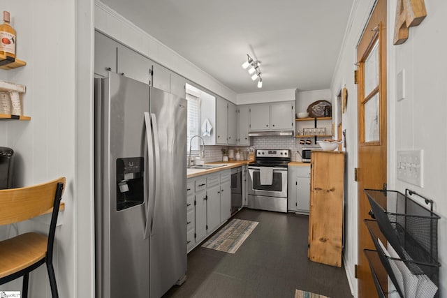 kitchen featuring open shelves, gray cabinets, and appliances with stainless steel finishes