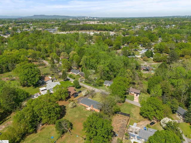 bird's eye view with a forest view
