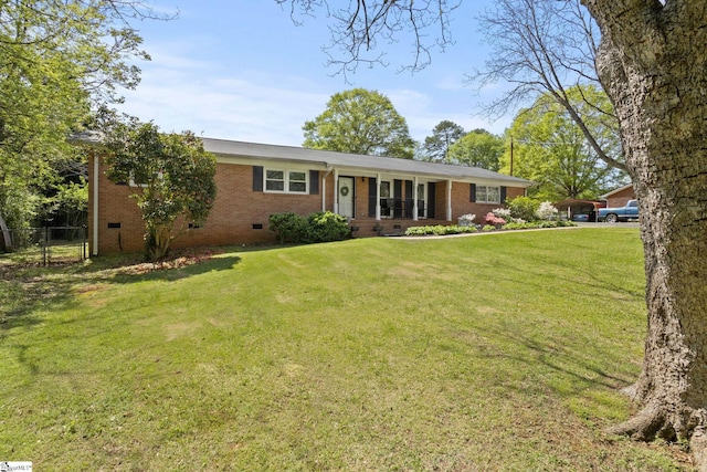single story home with crawl space, a front yard, fence, and brick siding