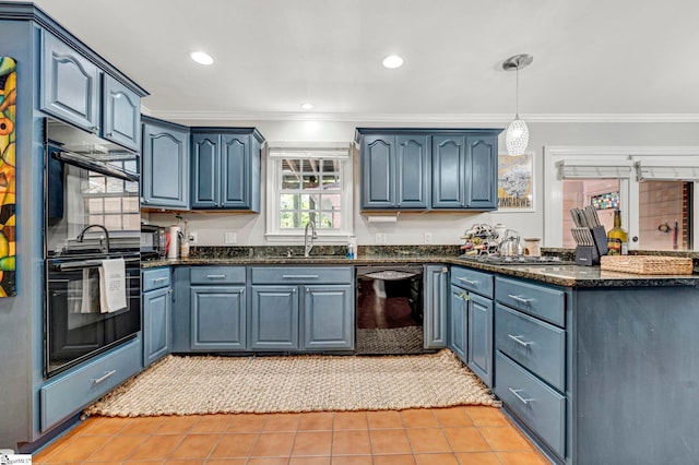 kitchen featuring dark stone countertops, hanging light fixtures, a sink, black appliances, and light tile patterned flooring