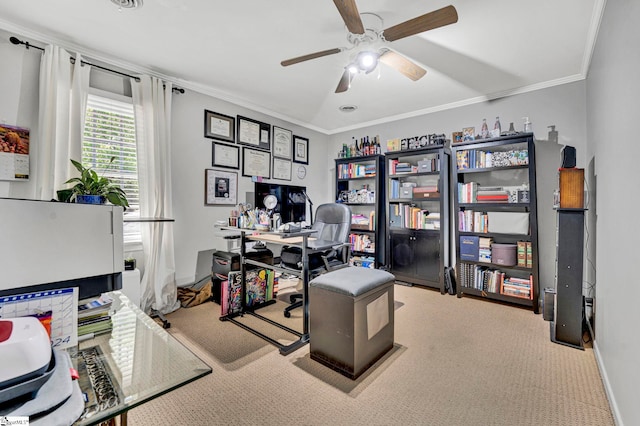 office space featuring ornamental molding, ceiling fan, carpet, and baseboards