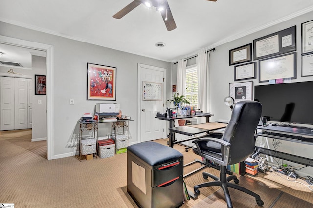 office space featuring light carpet, ceiling fan, crown molding, and visible vents