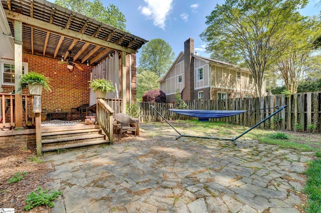 view of patio with fence
