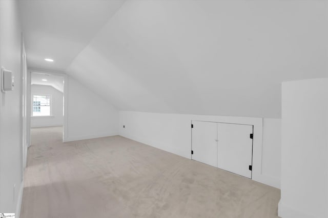 bonus room featuring carpet floors, recessed lighting, and vaulted ceiling