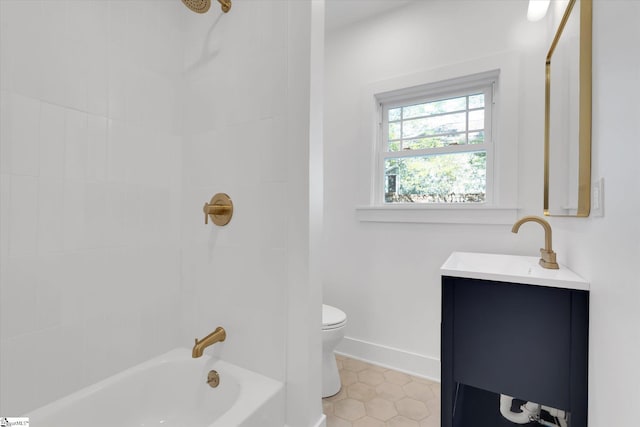 bathroom featuring baseboards, toilet, shower / bath combination, vanity, and tile patterned flooring