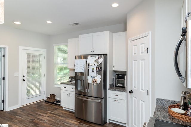 kitchen with recessed lighting, dark wood-style floors, white cabinetry, stainless steel refrigerator with ice dispenser, and visible vents