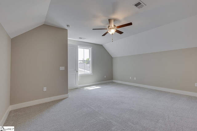 bonus room with visible vents, baseboards, a ceiling fan, carpet floors, and lofted ceiling
