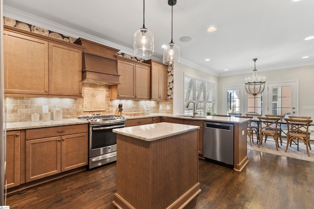 kitchen with custom range hood, an inviting chandelier, a peninsula, dark wood-style floors, and stainless steel appliances