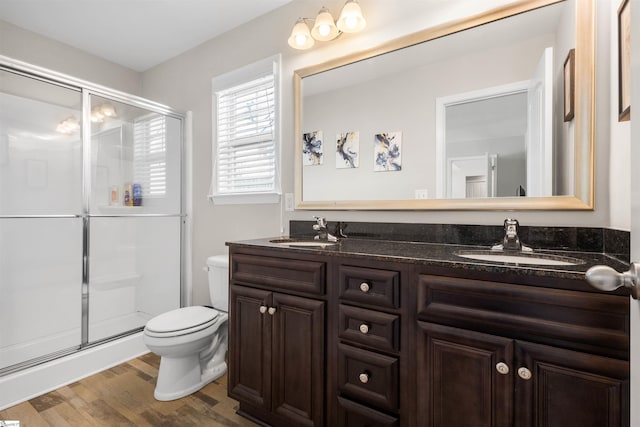 122 Barred Owl Dr, Fountain Inn, SC 29644 - full bath featuring a sink, toilet, a shower stall, and wood finished floors