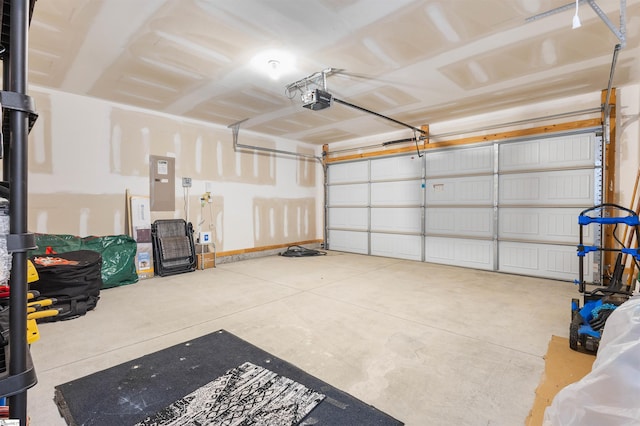 122 Barred Owl Dr, Fountain Inn, SC 29644 - garage featuring electric panel and a garage door opener
