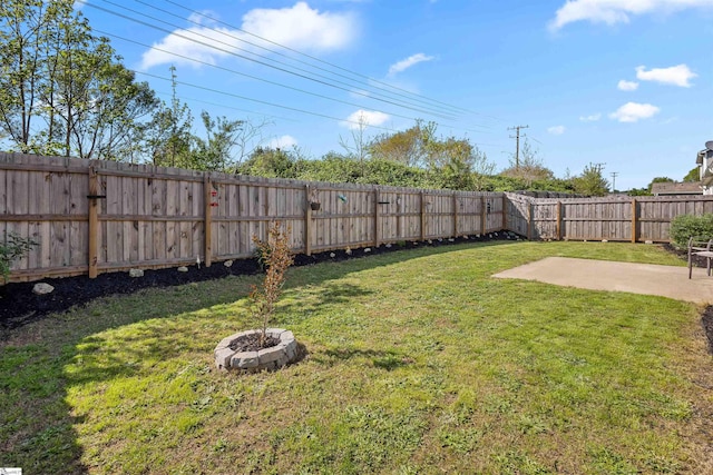 122 Barred Owl Dr, Fountain Inn, SC 29644 - view of yard featuring a fenced backyard, a fire pit, and a patio area