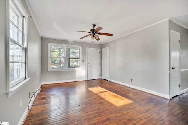 empty room featuring crown molding, ceiling fan, and hardwood / wood-style flooring