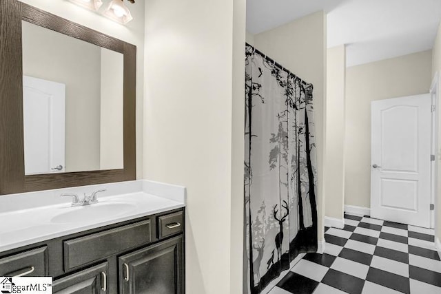 full bath featuring tile patterned floors and vanity