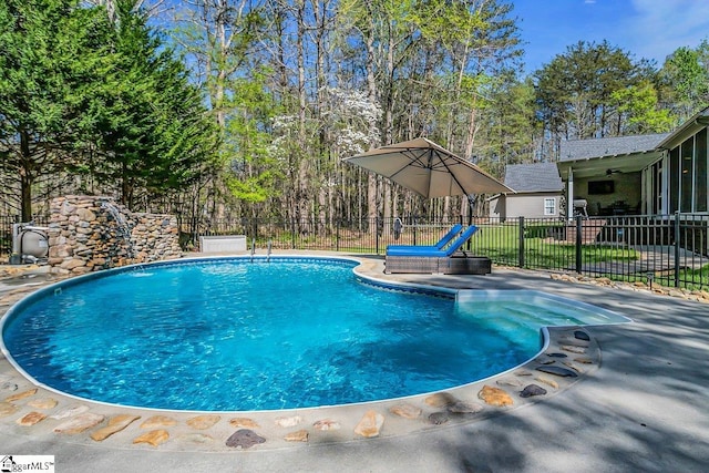 view of pool featuring a fenced in pool and fence