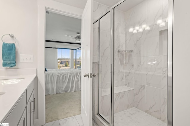 17 Starlake Rd, Simpsonville, SC 29681 - full bathroom featuring marble finish floor, a ceiling fan, connected bathroom, and a marble finish shower