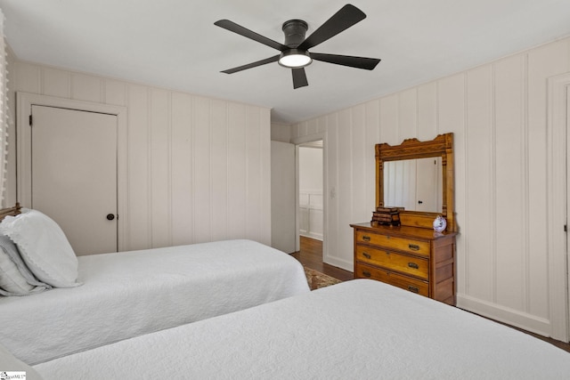 bedroom with wood finished floors and a ceiling fan
