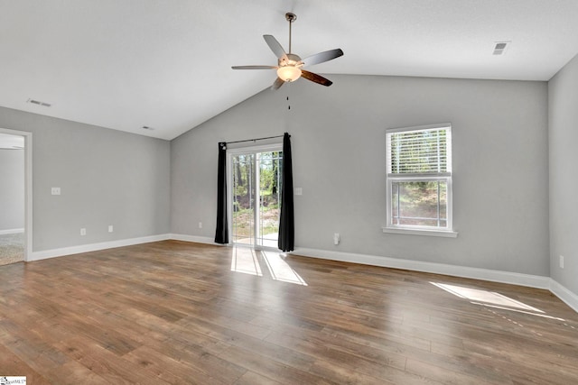 empty room featuring visible vents, baseboards, wood finished floors, and ceiling fan
