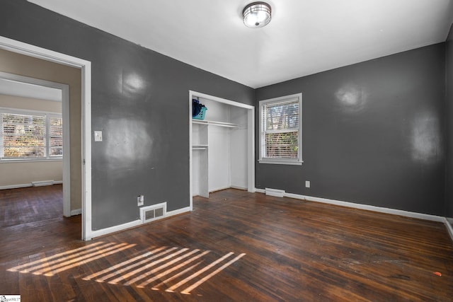 1020 Woodburn Rd, Spartanburg, SC 29302 - unfurnished bedroom with visible vents, baseboards, a closet, and wood finished floors