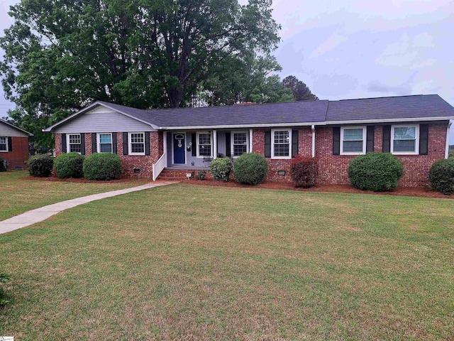 700 Chestnut St, Clinton, SC 29325 - single story home featuring brick siding, a front yard, and crawl space