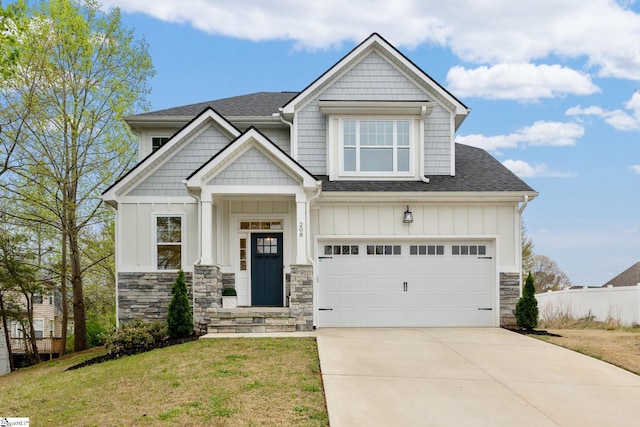 208 Orie Ct, Simpsonville, SC 29680 - craftsman inspired home with a front yard, a shingled roof, stone siding, and concrete driveway