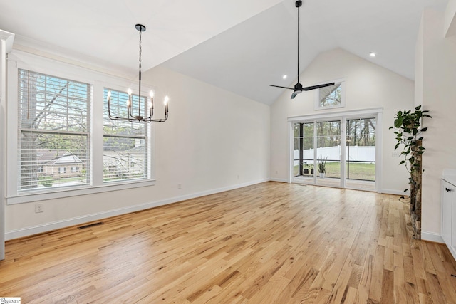 208 Orie Ct, Simpsonville, SC 29680 - unfurnished dining area with visible vents, baseboards, light wood-type flooring, ceiling fan with notable chandelier, and high vaulted ceiling