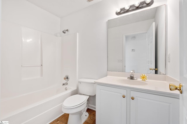 full bathroom with tile patterned floors, toilet, vanity, and shower / bathtub combination
