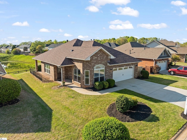 110 Airdale Ln, Simpsonville, SC 29680 - ranch-style house featuring brick siding, a front yard, an attached garage, and driveway