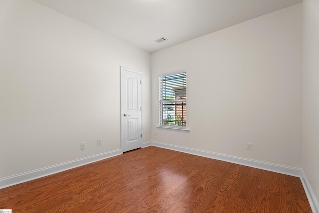 110 Airdale Ln, Simpsonville, SC 29680 - empty room with wood finished floors, baseboards, and visible vents