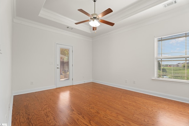 110 Airdale Ln, Simpsonville, SC 29680 - spare room featuring crown molding, ceiling fan, visible vents, wood finished floors, and a raised ceiling