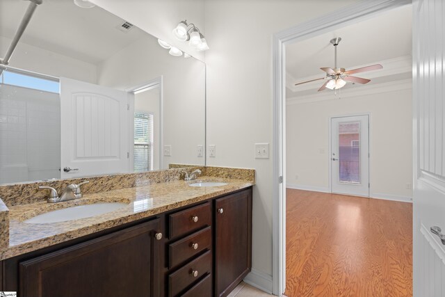 110 Airdale Ln, Simpsonville, SC 29680 - full bathroom with double vanity, a sink, a ceiling fan, and wood finished floors