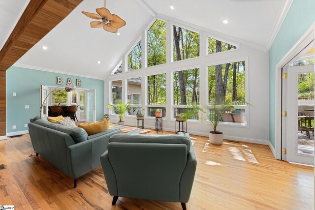 320 Nicklaus Rd, Westminster, SC 29693 - living area with baseboards, crown molding, visible vents, high vaulted ceiling, and wood finished floors