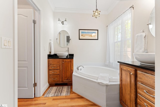 320 Nicklaus Rd, Westminster, SC 29693 - full bathroom featuring a bath, crown molding, wood finished floors, and a sink