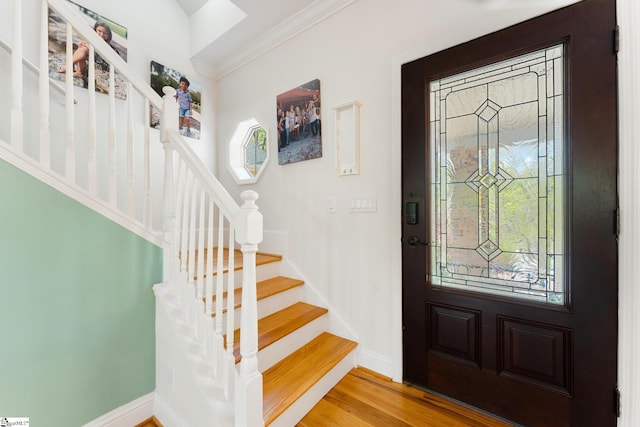 320 Nicklaus Rd, Westminster, SC 29693 - foyer entrance featuring crown molding, baseboards, stairway, and wood finished floors
